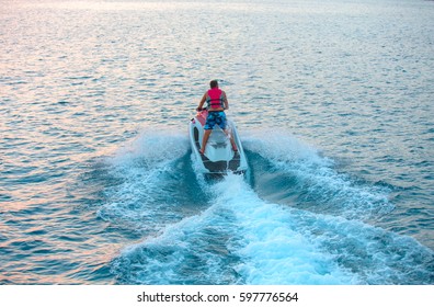 Man On Jetski Jump On The Wave At Sunset, Alanya Turkey