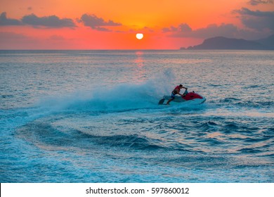 Man On Jetski Jump On The Wave At Sunset , Alanya Turkey