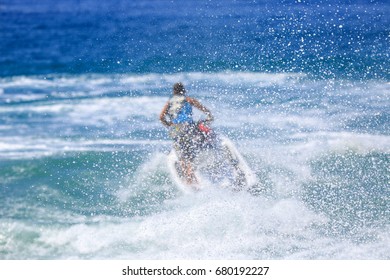 Man On Jetski Jump On The Wave