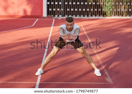 man on the playground doing exercise Fitness Model sports game