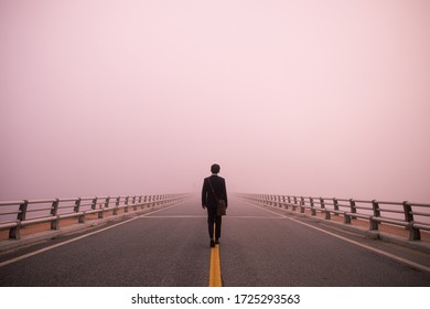 Man On The Road Who Can Not See Through The Fog