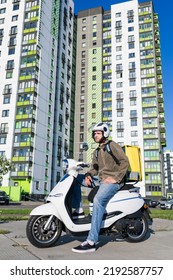 A Man On A Scooter, A Food Delivery Man. Fast Food Delivery Company