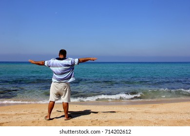 man on the seashore - Shutterstock ID 714202612