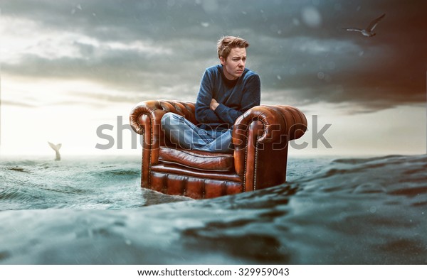 Man on a seat lost at\
sea