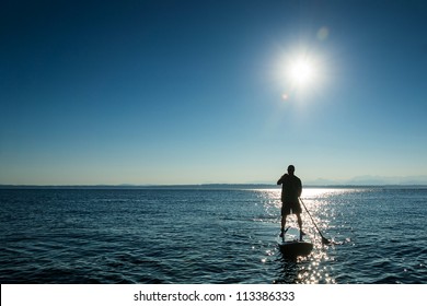 Man On Stand Up Paddle Board