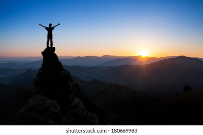 Man On Top Mountain Looking Sun Stock Photo (Edit Now) 180669983