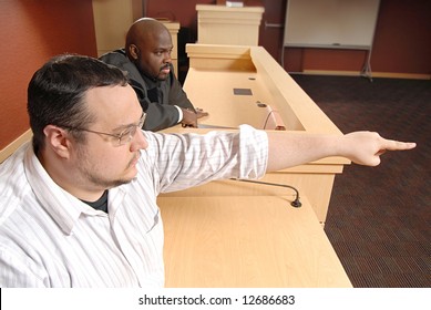 man-on-witness-stand-pointing-260nw-12686683.jpg