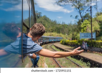 Man Onboard A Train Passing The Jungle Of Sri Lankan