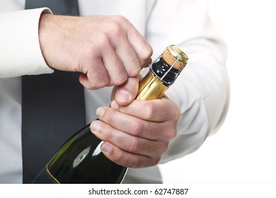 Man Open Champagne Bottle On White Background