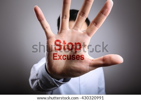 Man open the hand with the text Stop Excuses.