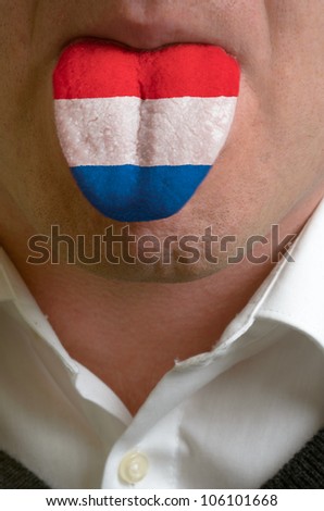 man with open mouth spreading tongue colored in netherlands flag as symbol of values like teaching, learning, multilingual speaking of different languages