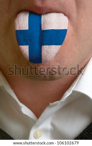 man with open mouth spreading tongue colored in finland flag as symbol of values like teaching, learning, multilingual speaking different of languages