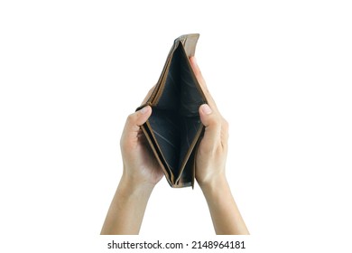 The man opened his brown wallet with no money in his pocket. He was in need, did not have enough money to spend, and was in debt. - Shutterstock ID 2148964181