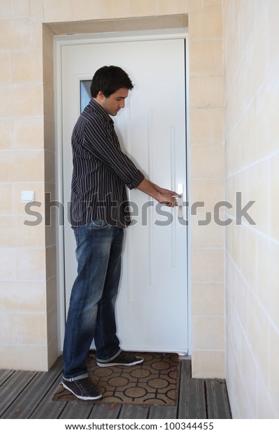 Man Opening Door Stock Photo Edit Now 100344455