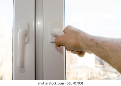 Man Is Opening The Window