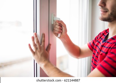 Man Is Opening The Window At Home To Refresh The Room