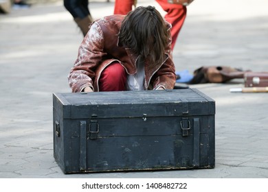 A Man Opens An Old Chest. Hand Opening An Old Antique Brown Wooden Treasure Chest Or Box.