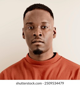 Man in orange tee portrait - Powered by Shutterstock