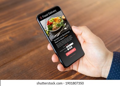 Man Ordering Food Online On Mobile Phone