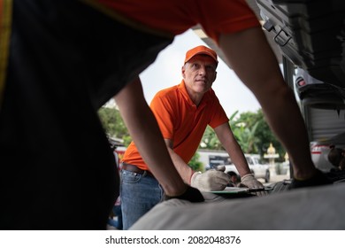 Man Owner Shop At Service Center, Car Repair, Tire Change. Mechanic Changing Engine, Service Car Workshop Automobile. Professional Man Shop Maintenance	