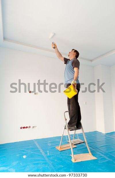 Man Painting Ceiling New Apartment Stock Photo Edit Now 97333730