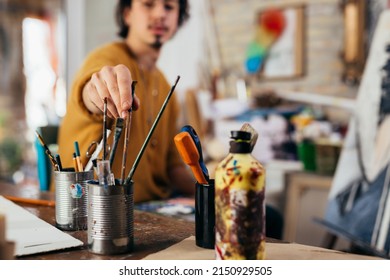 Man Painting Picture In His Atelier