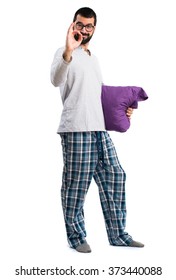 Man In Pajamas Making OK Sign