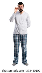 Man In Pajamas Showing Something