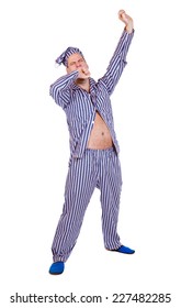 Man In Pajamas Yawning On White Background. Standing Man In Pajamas Yawning Isolated On White Background. Sleeping Man In Pajamas Yawning With A Night Cap.Man In Blue Striped Pajamas Makes A Big Yawn.