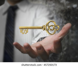 Man Palm Holding Dollar Sign Shape Golden Treasure Key.