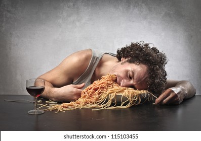 Man Passed Out From Eating Too Much Red Spaghetti