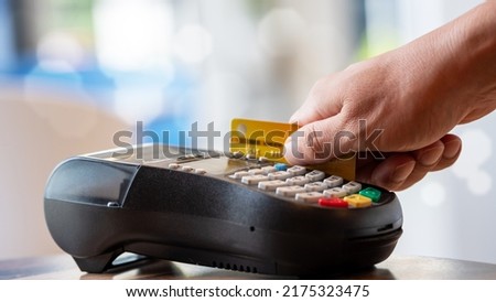 A Man paying credit card and entering pin code on credit card swipe machine for package promotion zero interest, webinar banner