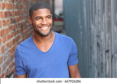 Man With A Perfect White Smile Looking Away