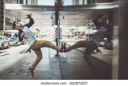 Man Performing Parkour Tricks In The Urban Center