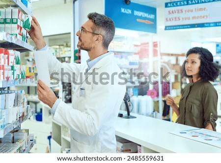 Man, pharmacist and checking shelf with customer for medication, option or choice at pharmacy. Mature medical employee looking at inventory, stock or pharmaceutical drugs for shopper at dispensary