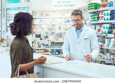 Man, pharmacist and writing prescription with customer for medication, healthcare advice or sick note at pharmacy. Mature medical employee taking notes for client dosage or diagnosis at dispensary - Powered by Shutterstock