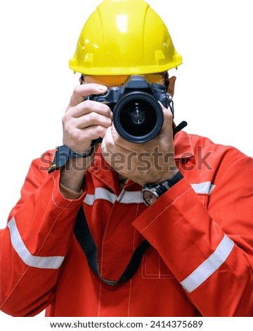 Man photographer at a construction site in a helmet with a DSLR camera on a white background. Close-up. Vertical photo.

