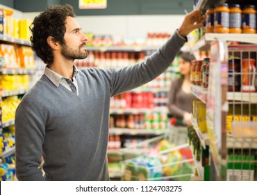 317 Man pick a basket in supermarket Stock Photos, Images & Photography ...