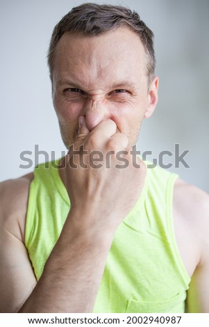 Man Pinches Nose Looks With Disgust Something Stinks Bad Smell