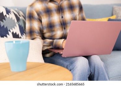 Man With Pink Laptop (no Face)