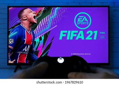 Man play FIFA 21 on Smart TV screen with Xbox Game Pass, 4 May, 2021, Sao Paulo, Brazil