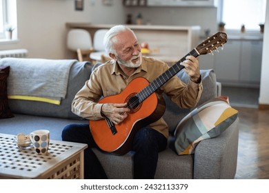 Man playing acoustic instrumental guitar playing new written song sound signing creative talented person. - Powered by Shutterstock