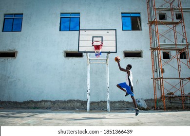 Man playing basketball in Juba, South Sudan on 2017-07-25