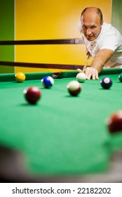 Man Playing Billiards