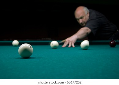 Man Playing Billiards