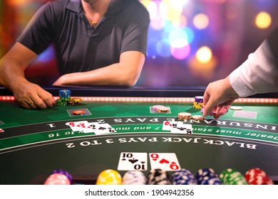 Man playing BlackJack at the casino - Shallow depth of field