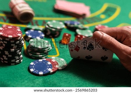 man playing blackjack at the table
