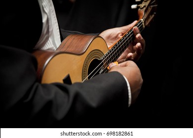 Man Playing Cavaquinho, Brazilian Instrument Used To Play Samba