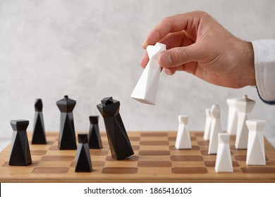 Man Playing Chess, Hand Close Up View. Victory Game.