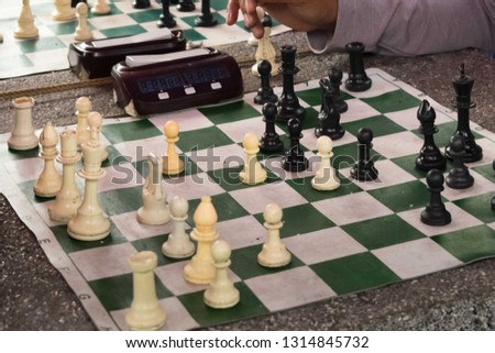 Man playing chess at the park